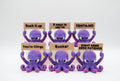 Group of purple octopus figures holding six humorous signs