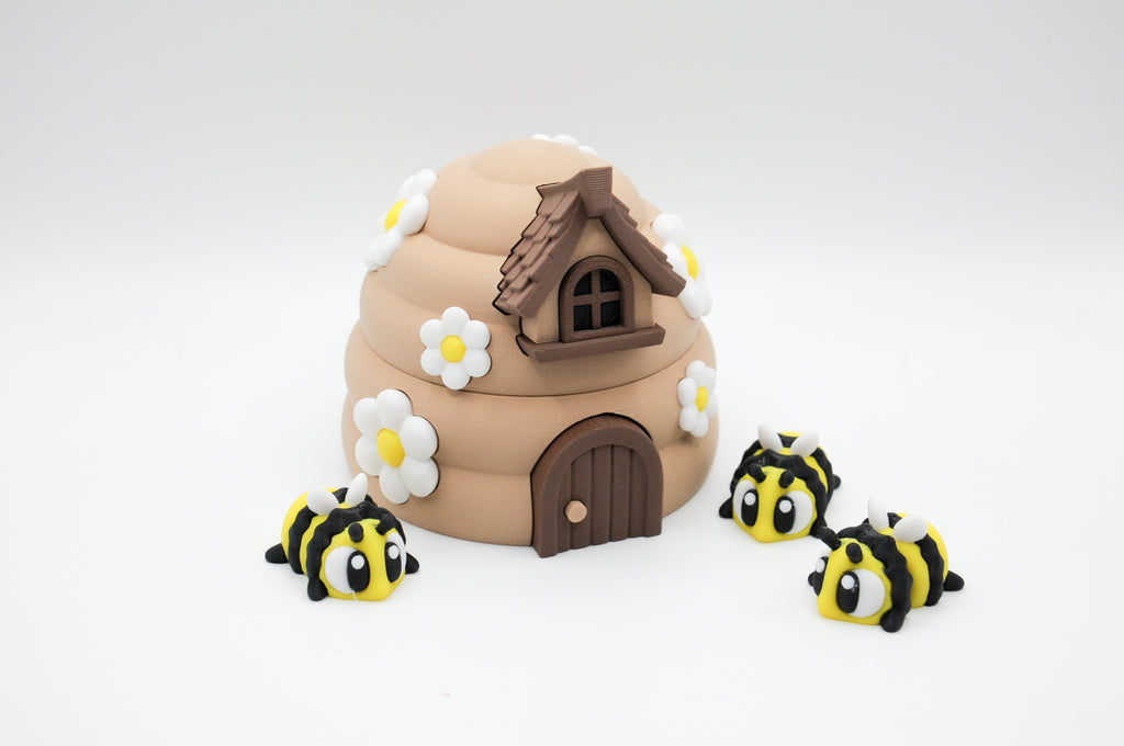 Rounded flower-covered bee hive with striped bee figures