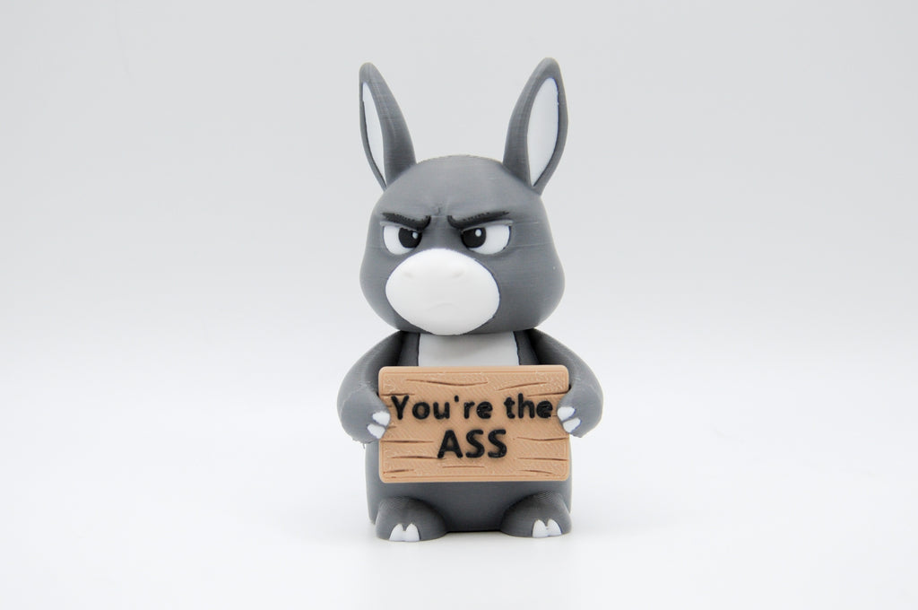 Donkey holding a You're the Ass sign