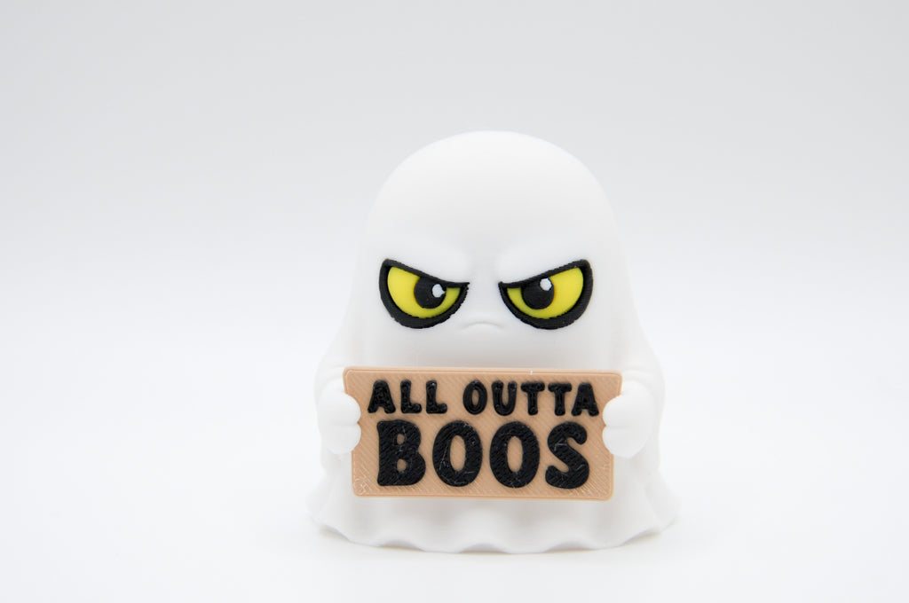 Ghost holding an All Outta Boos sign on a white background