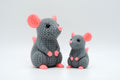 Gray knitted-style mouse figures in large and small sizes