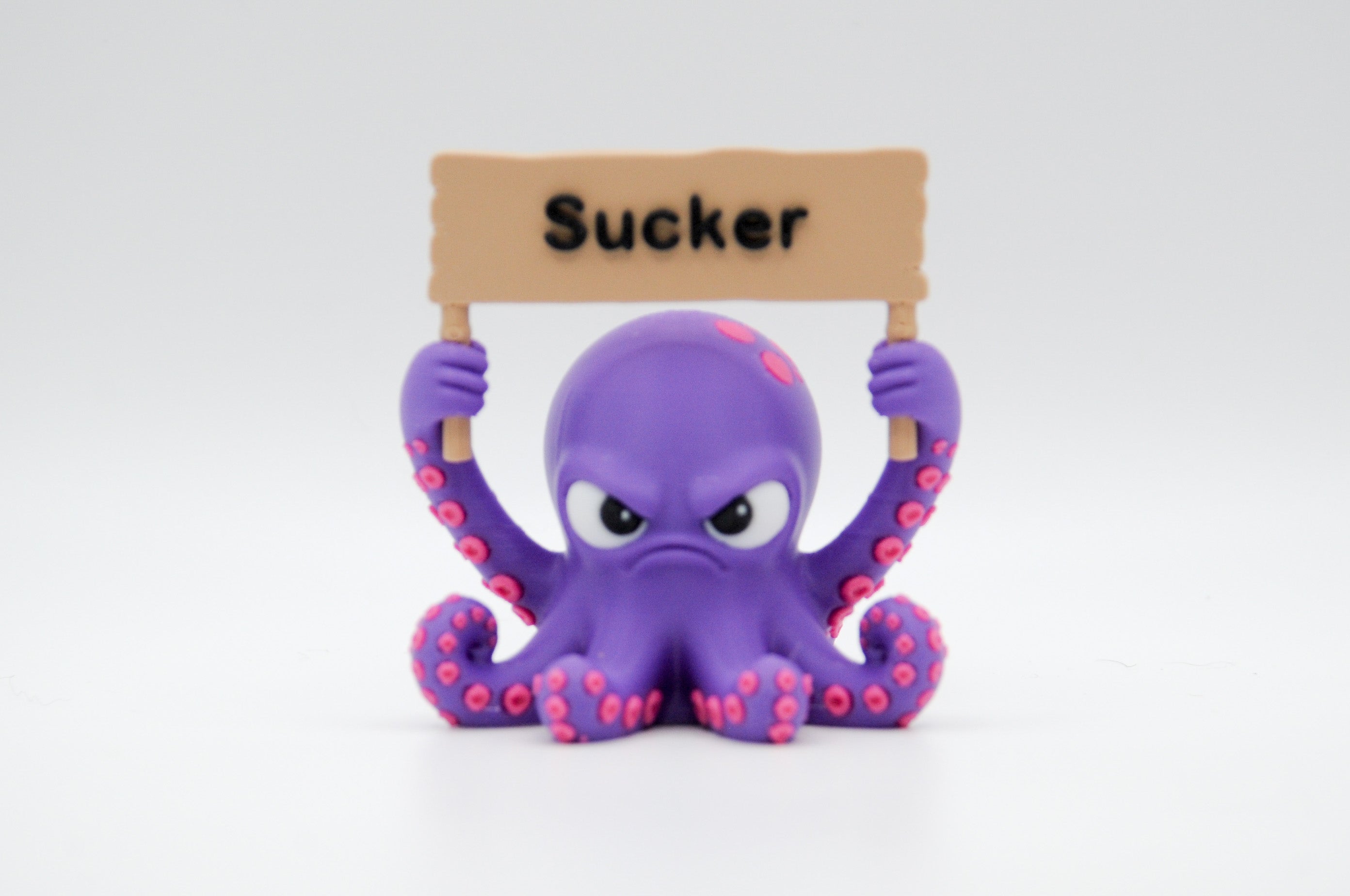 Purple octopus holding a Sucker sign