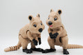 Two tan quokka figures posed together
