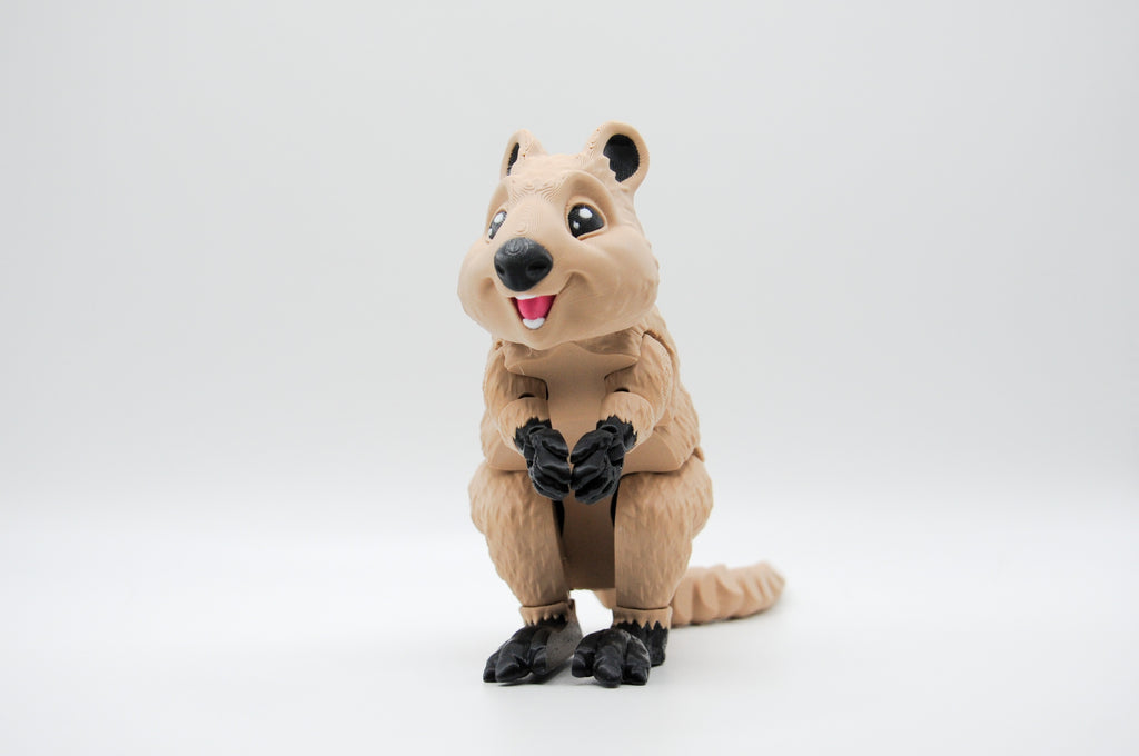 Full-body view of an upright tan quokka figure