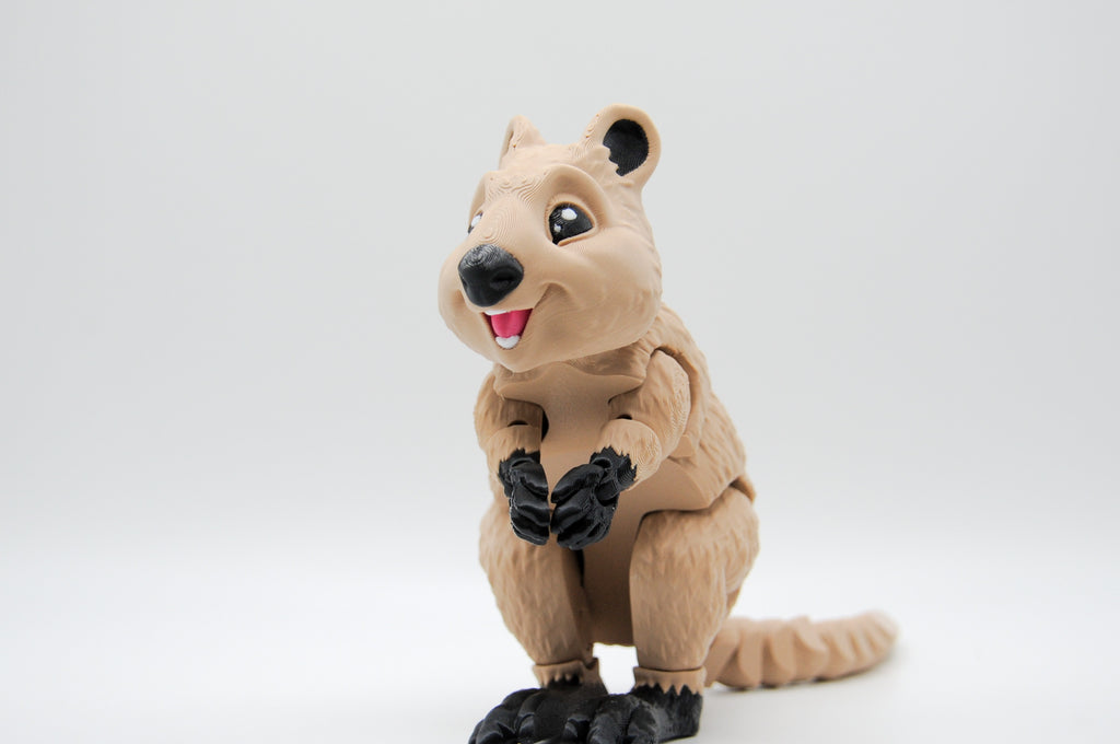Smiling tan quokka figure standing upright