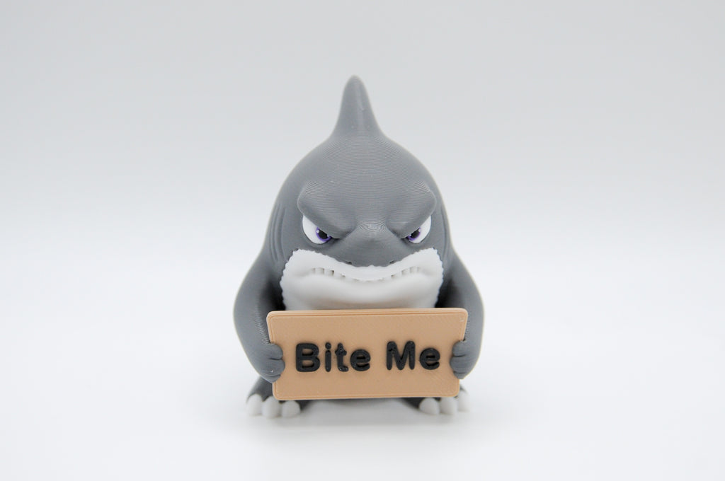 Shark holding a Bite Me sign